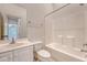 Bathroom features a single sink vanity, tiled floors, toilet, and shower-tub combo with a view through to the bedroom at 2701 Fountainhead Way, Mount Pleasant, SC 29466