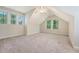 Bedroom with dormered ceilings, plush carpet, multiple windows for natural light and a ceiling fan at 2701 Fountainhead Way, Mount Pleasant, SC 29466
