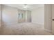 Spacious bedroom featuring plush carpet, neutral walls, natural light from the double windows, and a ceiling fan at 2701 Fountainhead Way, Mount Pleasant, SC 29466