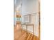 Bright entryway featuring wood floors, a console table, and views into a sunny living room at 2701 Fountainhead Way, Mount Pleasant, SC 29466