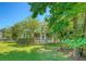 Lovely two-story home with a welcoming porch and lush landscaping surrounding the property at 2701 Fountainhead Way, Mount Pleasant, SC 29466