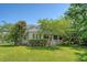 Charming two-story home featuring a manicured lawn, classic white trim, and a welcoming front porch at 2701 Fountainhead Way, Mount Pleasant, SC 29466