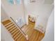 Bright foyer with open staircase, hardwood floors, and dining room view at 2701 Fountainhead Way, Mount Pleasant, SC 29466