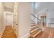 Bright foyer and staircase with hardwood floors at 2701 Fountainhead Way, Mount Pleasant, SC 29466