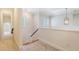 Hallway area with neutral carpet and crown molding on upper level at 2701 Fountainhead Way, Mount Pleasant, SC 29466