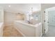 Hallway landing with light fixture and neutral carpeting and paint at 2701 Fountainhead Way, Mount Pleasant, SC 29466