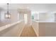 Upstairs hallway with neutral walls, carpet, crown molding and light fixture at 2701 Fountainhead Way, Mount Pleasant, SC 29466