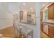 Kitchen bar with seating offering an open layout with granite counters and modern appliances at 2701 Fountainhead Way, Mount Pleasant, SC 29466