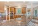 Spacious kitchen with granite countertops, stainless steel appliances, and wooden cabinetry at 2701 Fountainhead Way, Mount Pleasant, SC 29466