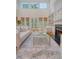 Spacious living room with a fireplace, built-in shelves, and a neutral color scheme at 2701 Fountainhead Way, Mount Pleasant, SC 29466
