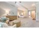 Expansive main bedroom is elegantly furnished, with sitting area and fireplace at 2701 Fountainhead Way, Mount Pleasant, SC 29466