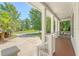 Spacious covered porch with views of the landscaped front yard and surrounding neighborhood at 2701 Fountainhead Way, Mount Pleasant, SC 29466