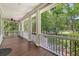 Screened porch with ceiling fan, outdoor views and decorative railings at 2701 Fountainhead Way, Mount Pleasant, SC 29466