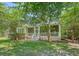 Charming home featuring a screened-in porch, surrounded by trees offering both privacy and shade at 2701 Fountainhead Way, Mount Pleasant, SC 29466