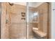 Walk-in shower featuring tile surround, a built-in bench, and modern fixtures at 2701 Fountainhead Way, Mount Pleasant, SC 29466