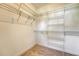 Well-organized walk-in closet with multiple wire shelves and carpeted floor at 2701 Fountainhead Way, Mount Pleasant, SC 29466