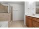 Well-lit bathroom with tile flooring, glass shower and vanity with sink at 272 Overcup Loop, Summerville, SC 29486