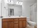 Spacious bathroom featuring a double sink vanity with a large mirror and a toilet at 272 Overcup Loop, Summerville, SC 29486