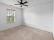 Cozy bedroom featuring neutral carpet and a bright window with a view at 272 Overcup Loop, Summerville, SC 29486