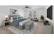Elegant main bedroom with luxurious bedding, stylish decor, and a large window for natural light at 272 Overcup Loop, Summerville, SC 29486