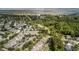 An aerial view of a beautiful, green neighborhood and landscape, surrounded by lush, mature trees and waterway access at 3000 Treadwell St, Mount Pleasant, SC 29466