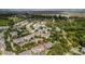 Picturesque aerial shot featuring homes with lush trees, coastal scenery, and charming ponds at 3000 Treadwell St, Mount Pleasant, SC 29466