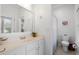 Bathroom features a vanity and tiled shower with blue and white shower curtain at 3000 Treadwell St, Mount Pleasant, SC 29466