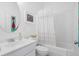 Fresh bathroom with a shower, white vanity, and stylish decor at 3000 Treadwell St, Mount Pleasant, SC 29466