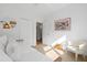 Clean bedroom with a daybed, woven storage basket, and closet with an adjoining bathroom at 3000 Treadwell St, Mount Pleasant, SC 29466