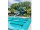 Enjoy the community pool and slide, with plenty of room to lay out and soak up the sun with views of the trees at 3000 Treadwell St, Mount Pleasant, SC 29466