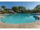 Community pool with a slide, mature landscaping, and a separate wading pool for , offering Gathering fun at 3000 Treadwell St, Mount Pleasant, SC 29466