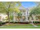 Lovely two-story home featuring a double porch, lush landscaping, and welcoming curb appeal at 3000 Treadwell St, Mount Pleasant, SC 29466