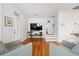 Cozy living room with hardwood floors, a flat-screen TV, and neutral furniture at 3000 Treadwell St, Mount Pleasant, SC 29466