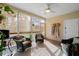 Spacious screened-in porch with comfortable seating and natural light at 3000 Treadwell St, Mount Pleasant, SC 29466