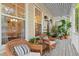 View of the covered porch with seating and views of the neighborhood at 3000 Treadwell St, Mount Pleasant, SC 29466