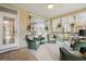 Screened-in porch with seating area at 3000 Treadwell St, Mount Pleasant, SC 29466