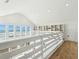 Bright hallway boasts ocean views from windows and built-in shelves for ample storage at 313 E Arctic Ave, Folly Beach, SC 29439