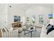 Inviting living room with high ceilings, ample seating, and beach-inspired decor at 313 E Arctic Ave, Folly Beach, SC 29439