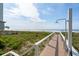 Outdoor shower with a beach view, situated on the boardwalk to the beach at 313 E Arctic Ave, Folly Beach, SC 29439