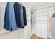 Bright, organized walk-in closet featuring custom shelving, drawers, and hanging space for optimal storage at 313 E Arctic Ave, Folly Beach, SC 29439