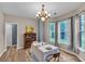 Light and airy formal dining area featuring ample natural light and neutral colors at 3290 Middleburry Ln, Charleston, SC 29414