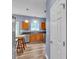Galley kitchen featuring stainless steel appliances, wood cabinets, and a breakfast bar at 3290 Middleburry Ln, Charleston, SC 29414