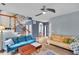 Spacious living room with hardwood floors, staircase, and a welcoming atmosphere at 3290 Middleburry Ln, Charleston, SC 29414