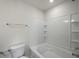 Bathroom featuring a bathtub with white tile surround and a toilet at 335 Bremerton Dr, Goose Creek, SC 29445