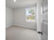 Bedroom with neutral carpet, a window with natural light, and a white door at 335 Bremerton Dr, Goose Creek, SC 29445