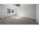 Bedroom boasts natural light, neutral carpet, and easy access to the outdoors at 335 Bremerton Dr, Goose Creek, SC 29445