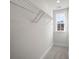 Bright walk-in closet features wire shelving and a window for natural light at 335 Bremerton Dr, Goose Creek, SC 29445