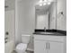 Bathroom featuring a sleek vanity with dark countertop and mirror, toilet, and tub shower combo at 327 Hillman Trl Dr, Moncks Corner, SC 29461
