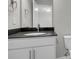 Bathroom featuring a sleek vanity with dark countertop and mirror, toilet, and modern fixtures at 327 Hillman Trl Dr, Moncks Corner, SC 29461