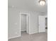 Neutral bedroom featuring a closet with white wire shelving and en-suite bathroom at 327 Hillman Trl Dr, Moncks Corner, SC 29461